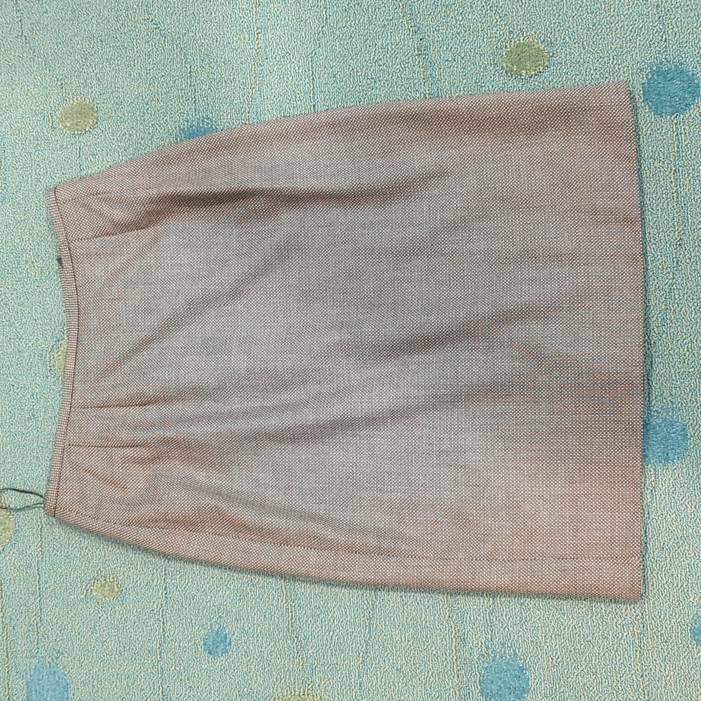 Basic work skirt in brown with small diamond pattern. Size 4.